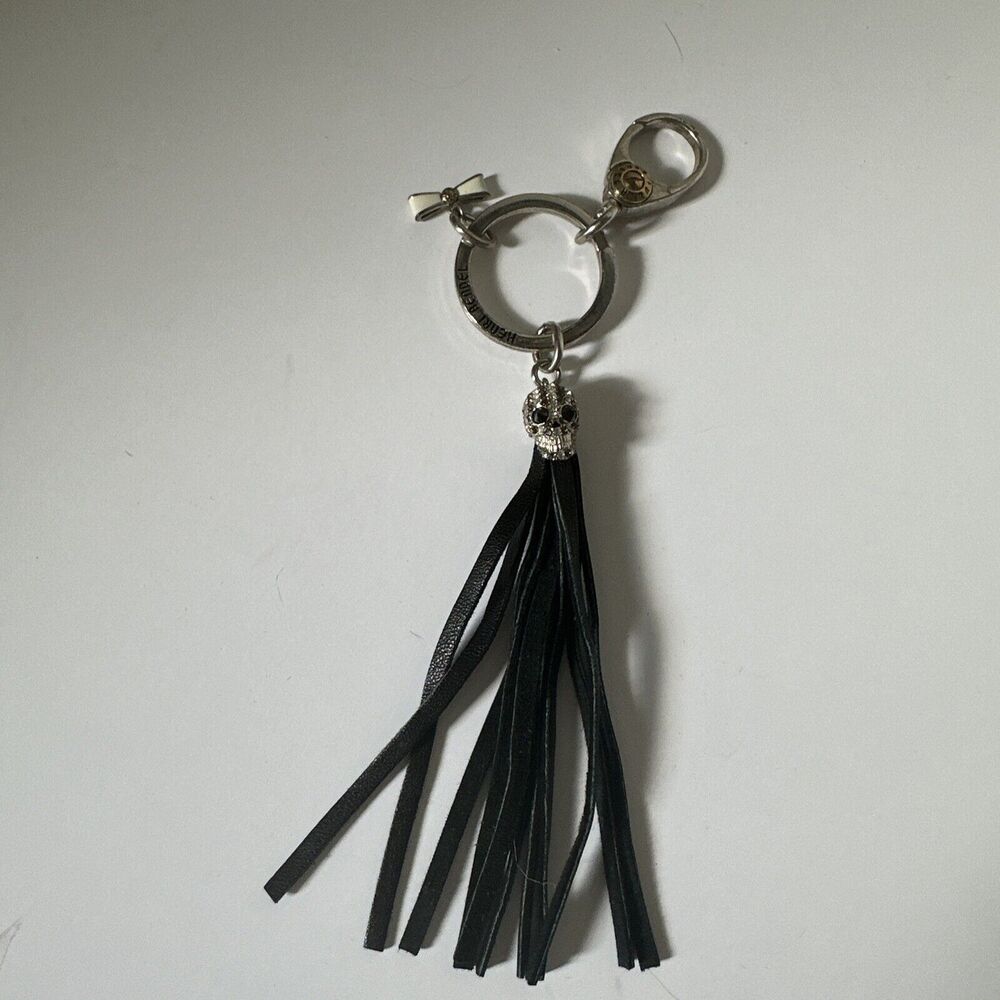HENRI BENDEL Keyring Black Tassel Jeweled Skull Cream Bow Charm Keychain